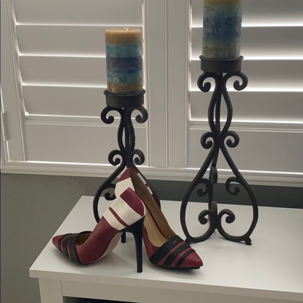 GX red heels with black and white stripes